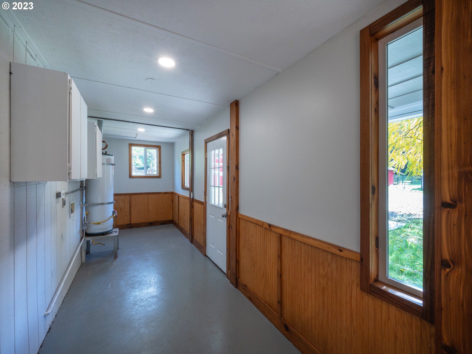 1590 Romie Howard Road Yoncalla, OR 97499 - Photo 15 of 48 a view of a room with window and wooden floor