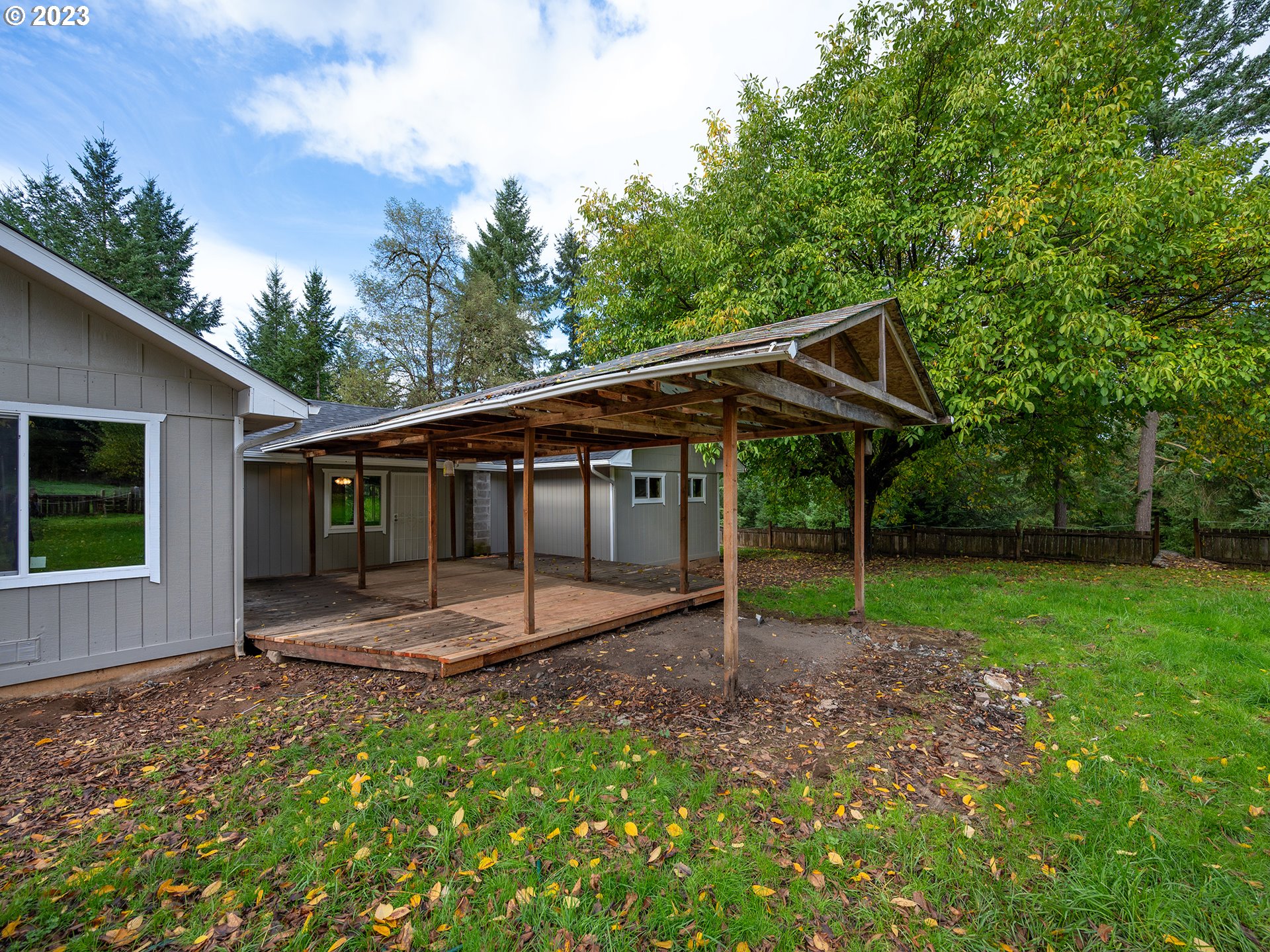 1590 Romie Howard Road Yoncalla, OR 97499 - Photo 33 of 48 a backyard of a house with table and chairs