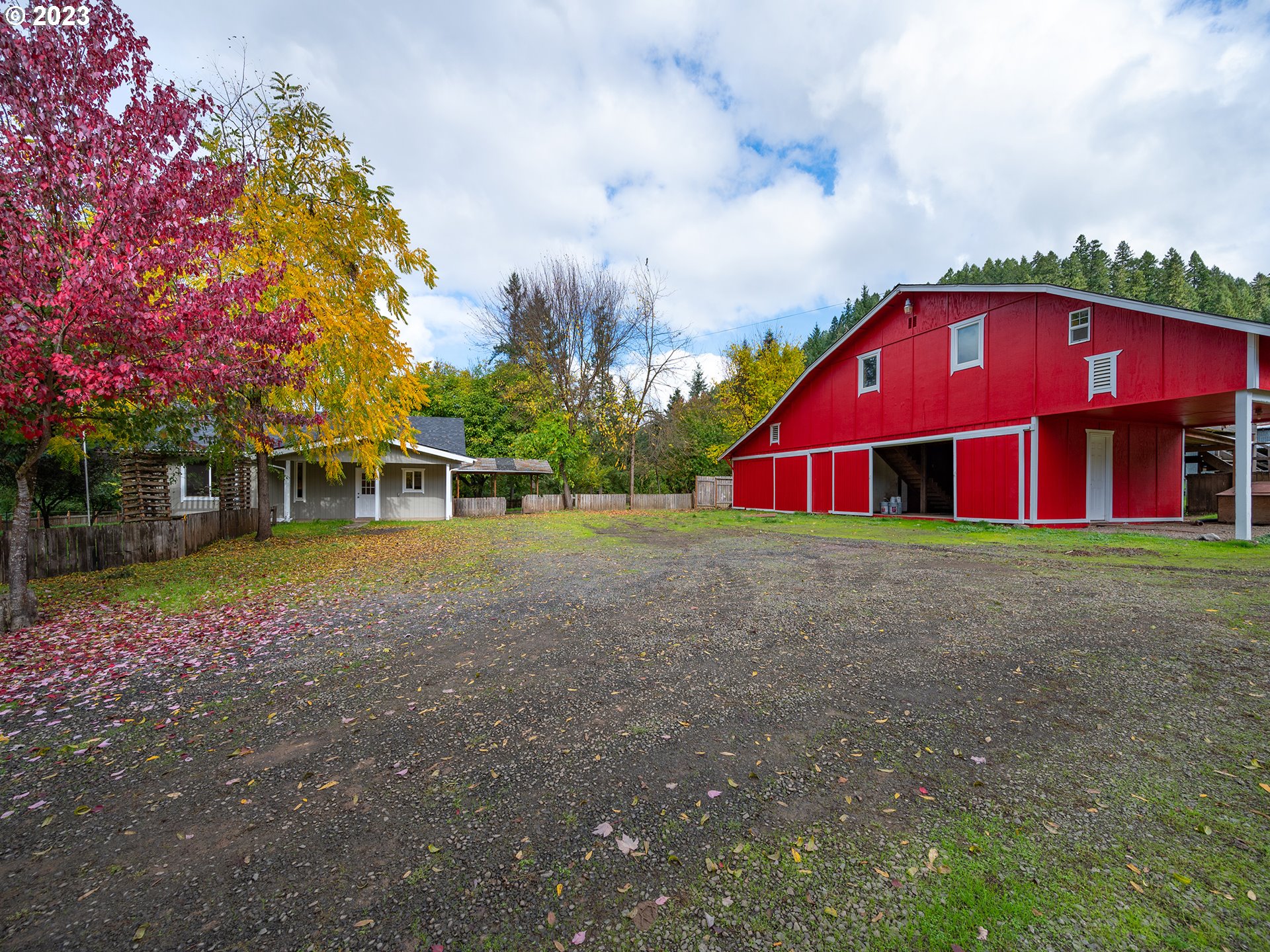 1590 Romie Howard Road Yoncalla, OR 97499 - Photo 36 of 48 a view of a house with a yard