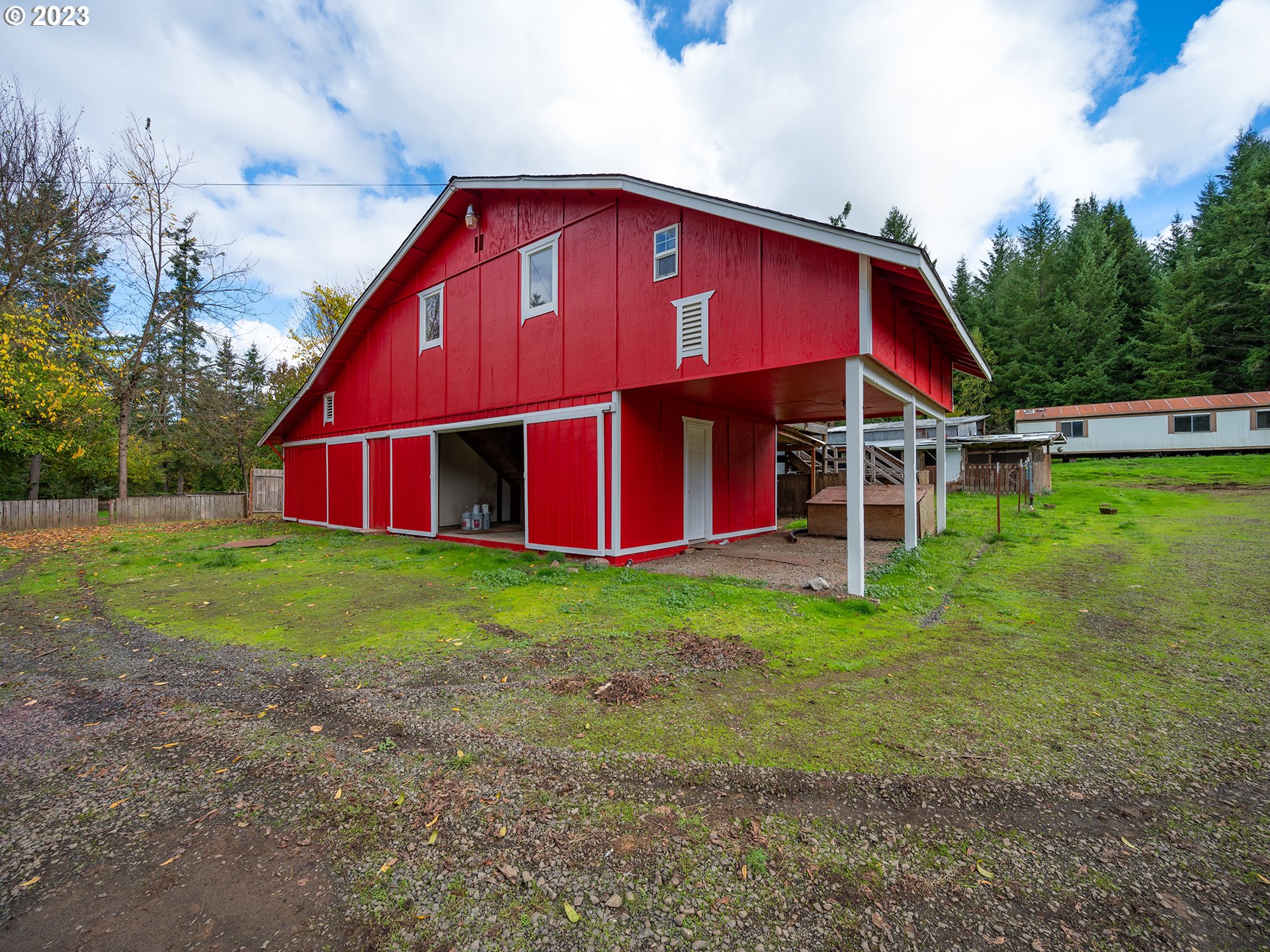 1590 Romie Howard Road Yoncalla, OR 97499 - Photo 40 of 48 a view of a small house with a yard