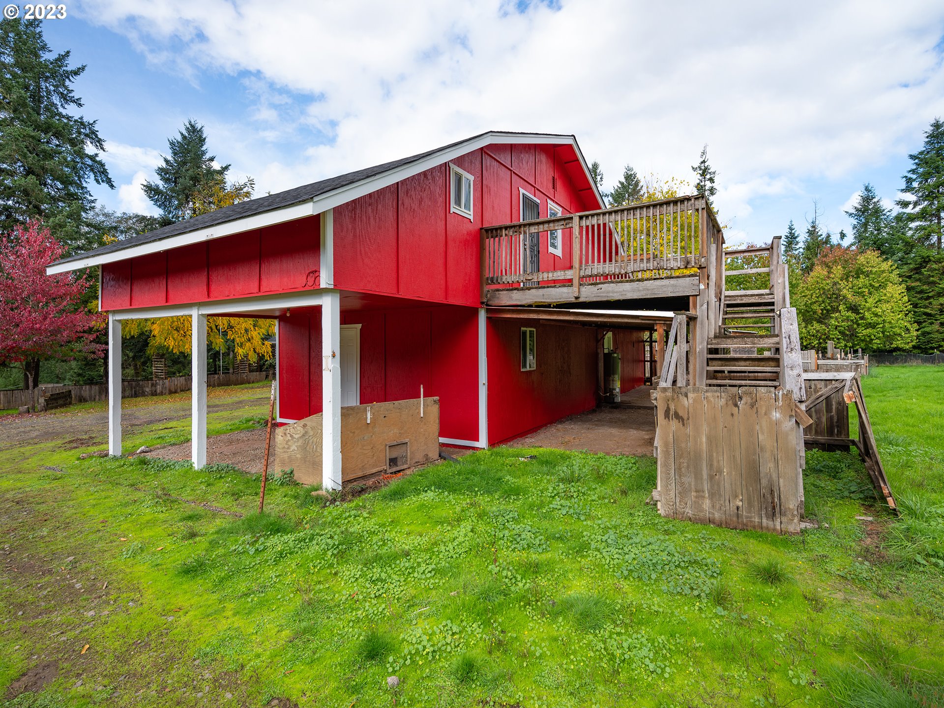1590 Romie Howard Road Yoncalla, OR 97499 - Photo 41 of 48 a view of backyard of house with deck and outdoor seating