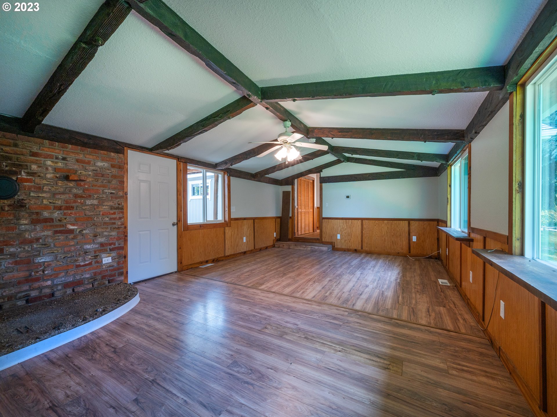 1590 Romie Howard Road Yoncalla, OR 97499 - Photo 8 of 48 a view of empty room with wooden floor