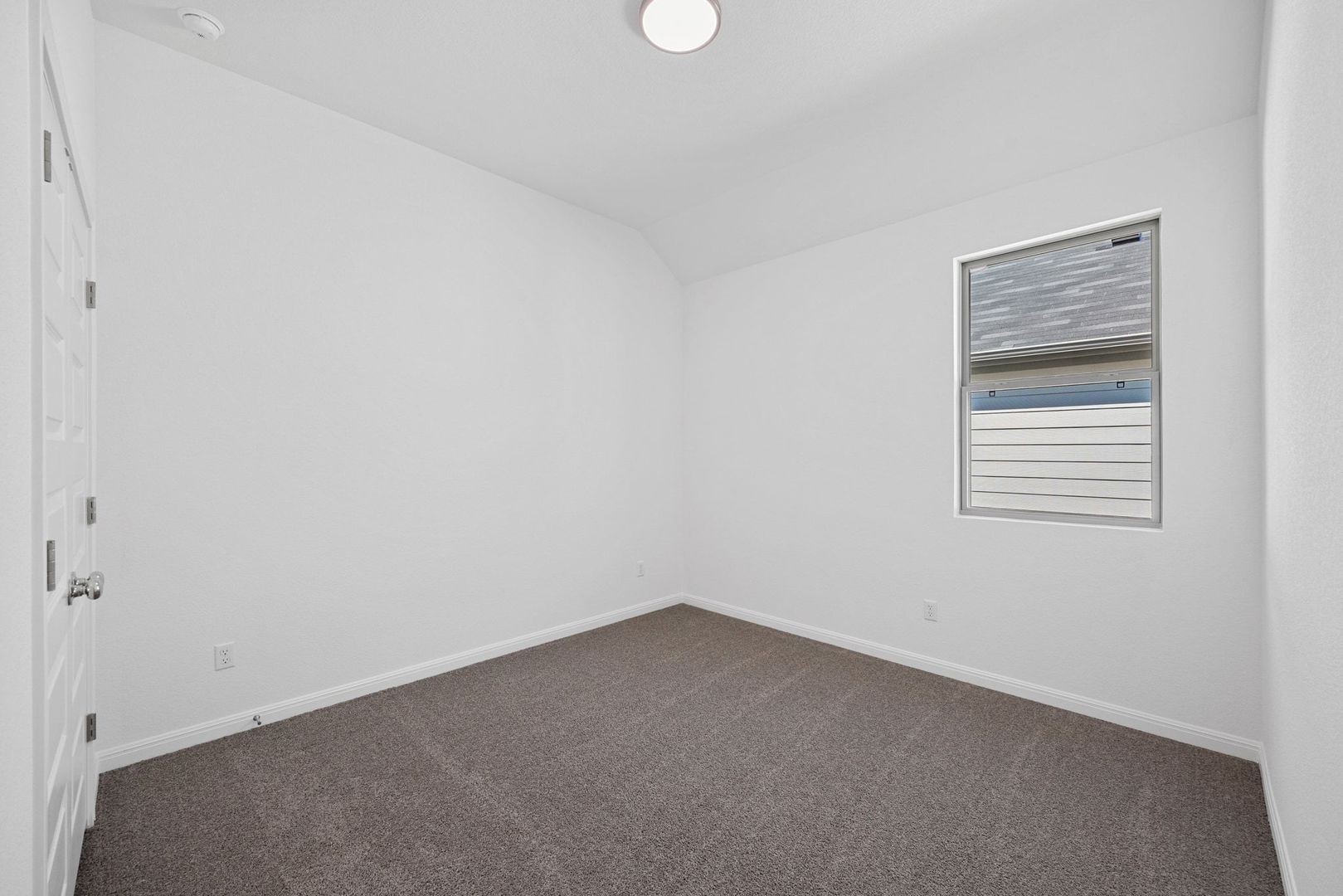 310 Bendecido Loop Elgin, TX 78621 - Photo 21 of 40 an empty room with a window