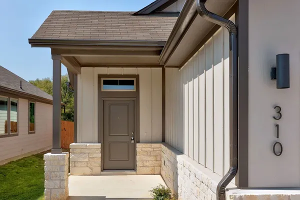 a front view of a house with shower