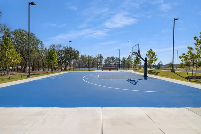a view of a house with a park