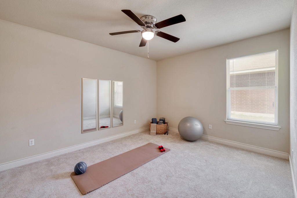 1303 Ridgewood Drive Leander, TX 78641 - Photo 17 of 28 wooden floor and window in a room