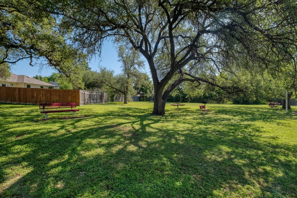 1303 Ridgewood Drive Leander, TX 78641 - Photo 25 of 28 a view of a park with large trees