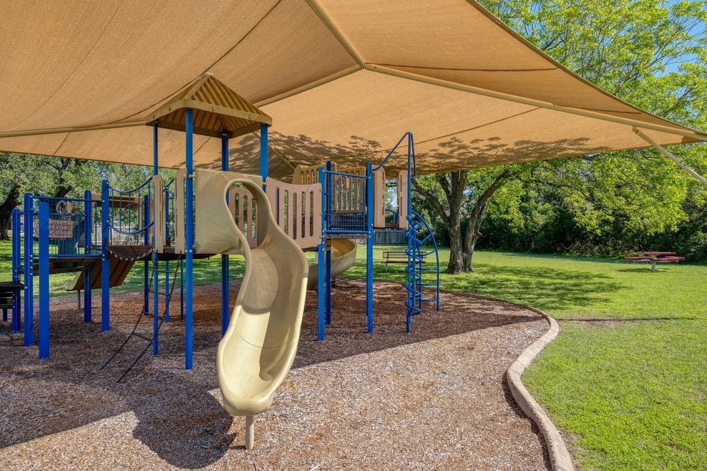 1303 Ridgewood Drive Leander, TX 78641 - Photo 27 of 28 a view of a park with slide