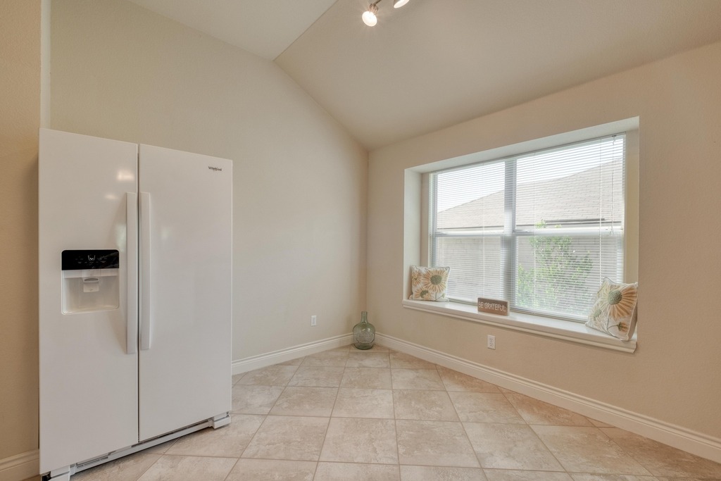 1303 Ridgewood Drive Leander, TX 78641 - Photo 8 of 28 a view of an empty room with a window