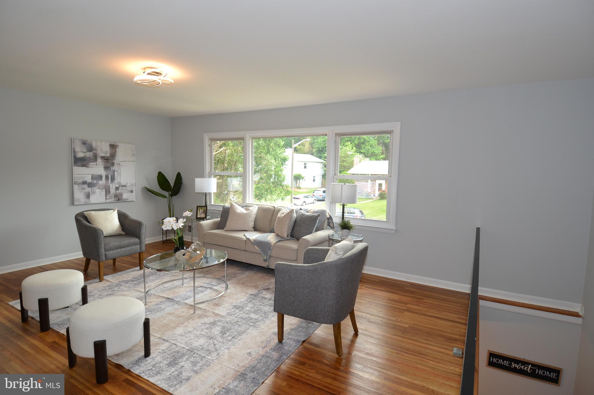 7103 Galgate Drive Springfield, VA 22152 - Photo 13 of 47 a living room with furniture and a window