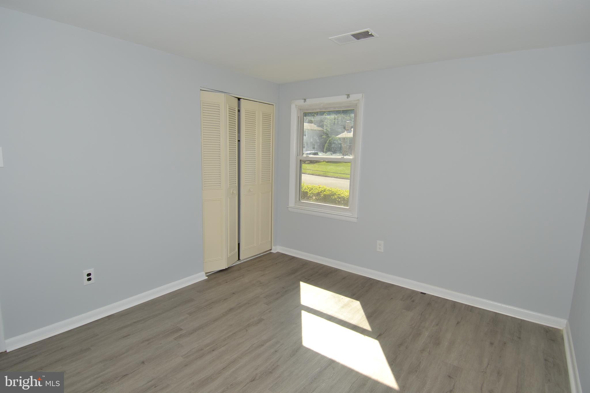 7103 Galgate Drive Springfield, VA 22152 - Photo 24 of 47 a view of an empty room and window