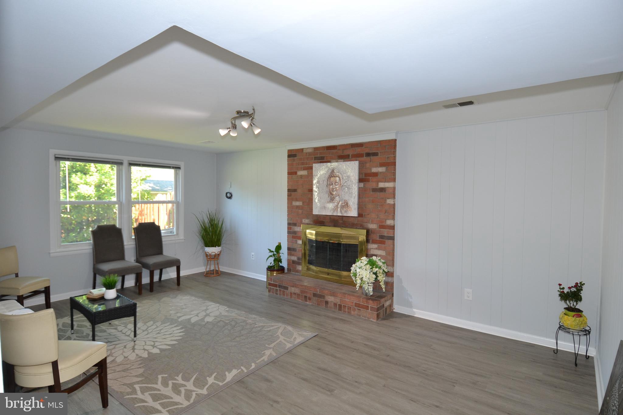 7103 Galgate Drive Springfield, VA 22152 - Photo 31 of 47 a living room with furniture and wooden floor