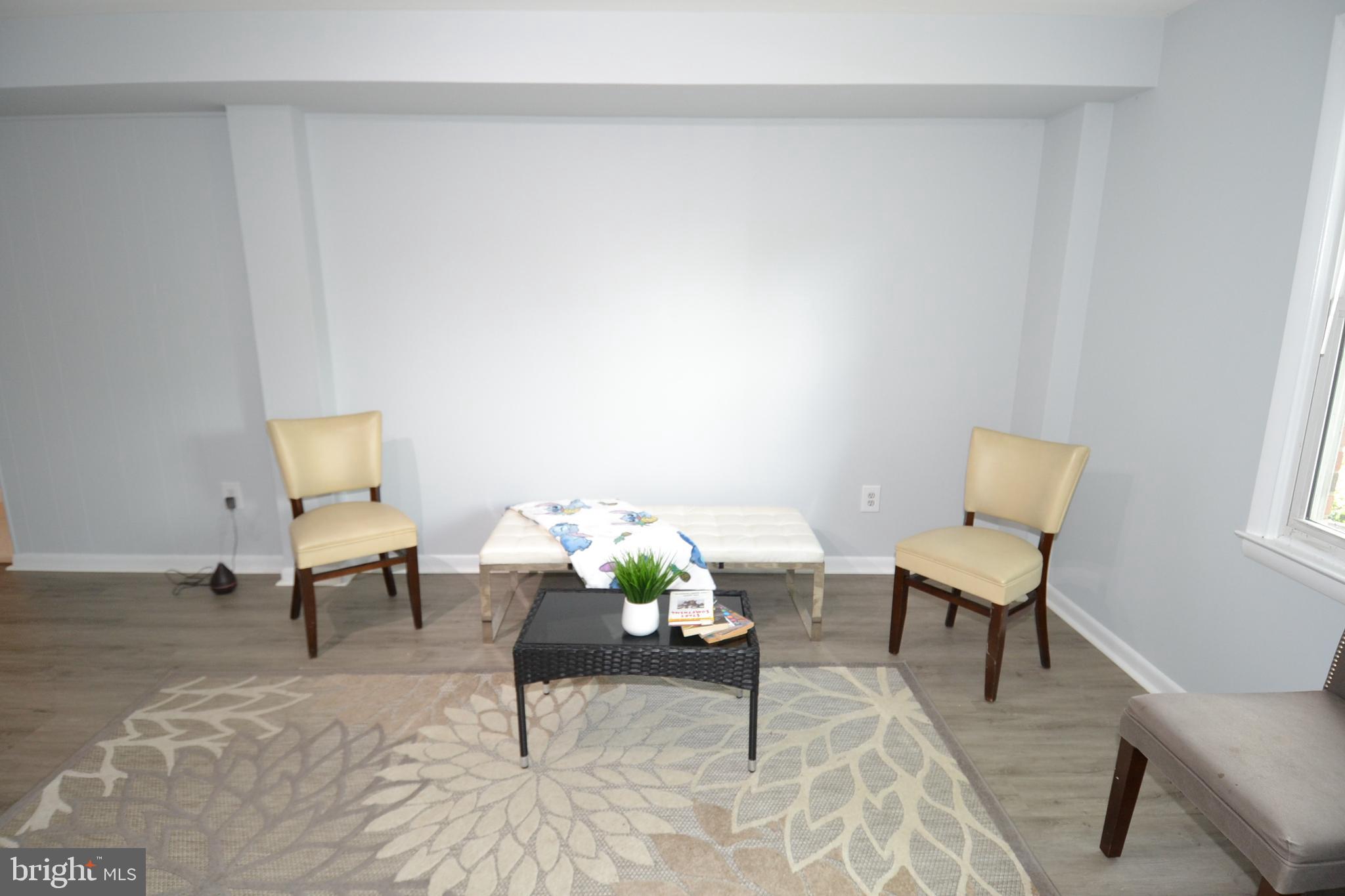 7103 Galgate Drive Springfield, VA 22152 - Photo 35 of 47 a living room with furniture and a window