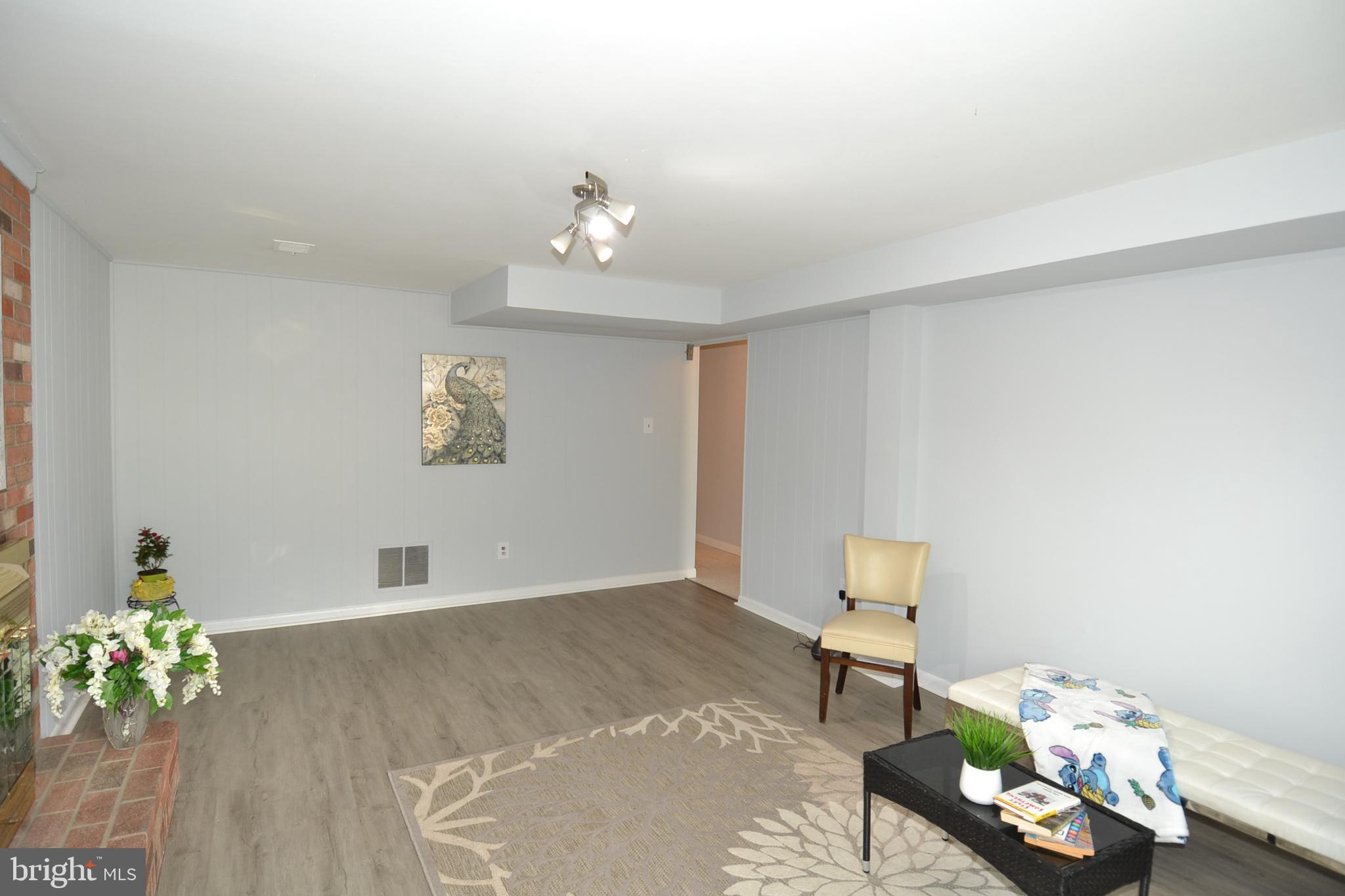 7103 Galgate Drive Springfield, VA 22152 - Photo 36 of 47 a living room with furniture