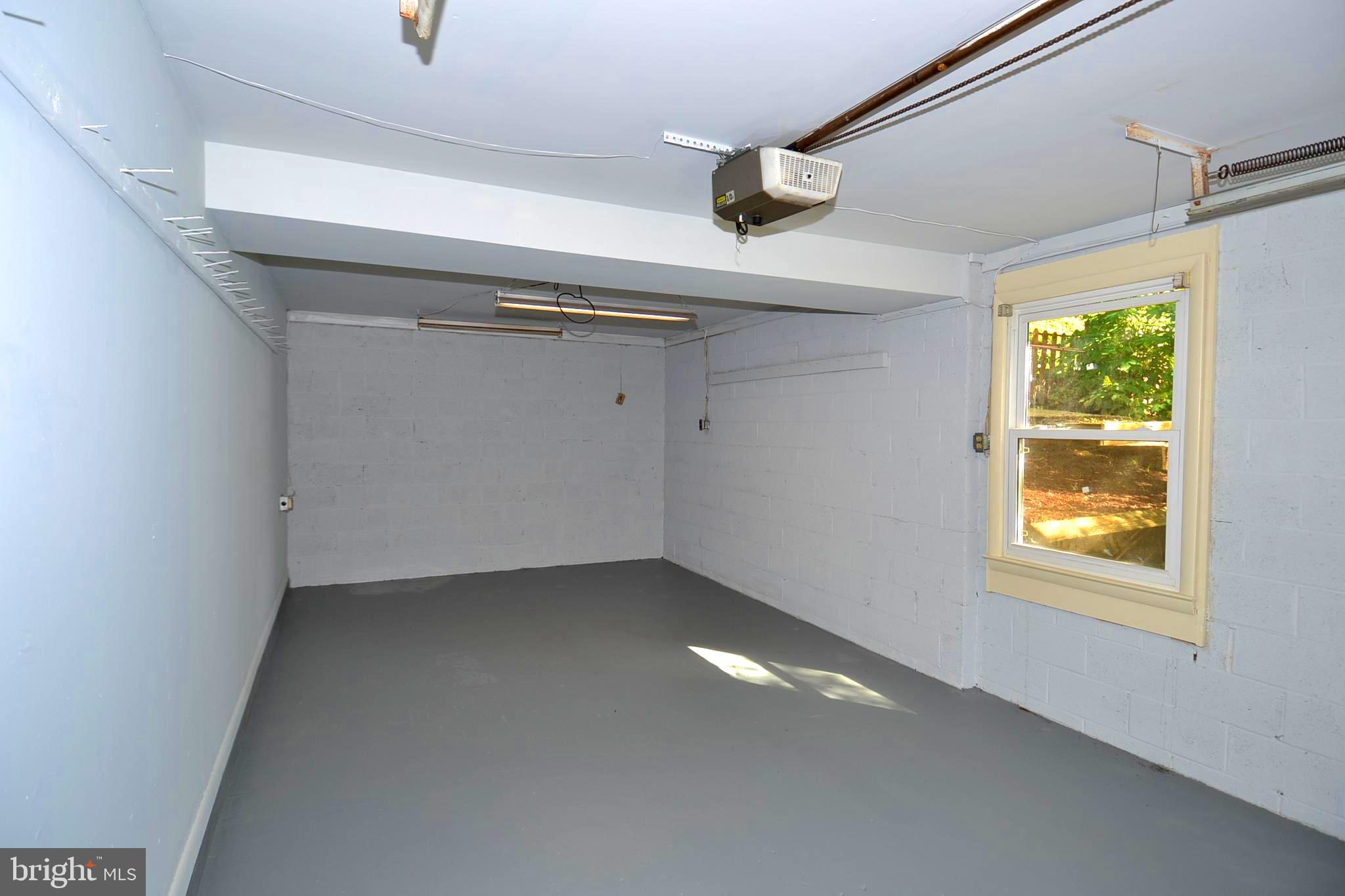 7103 Galgate Drive Springfield, VA 22152 - Photo 42 of 47 a view of an empty room with a window