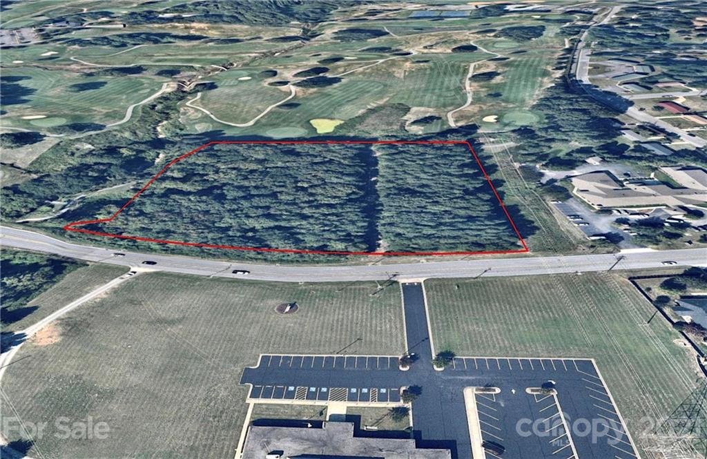 4.75-acres Union Road Gastonia, NC 28054 - Photo 2 of 16 a view of a wooden terrace with a bench