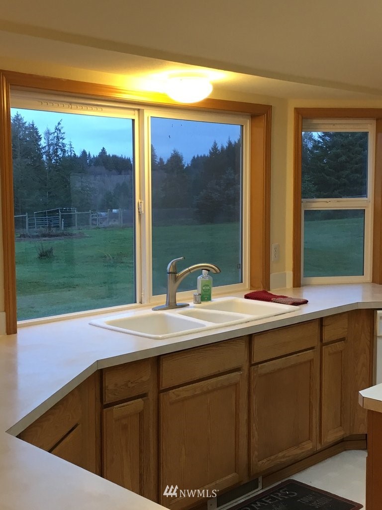 896 King Road Winlock, WA 98596 - Photo 7 of 39 a kitchen with a sink and large window