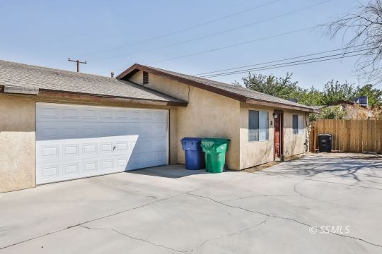 817 Commercial Ridgecrest, CA 93555 - Photo 3 of 6 a view of a house with a garage
