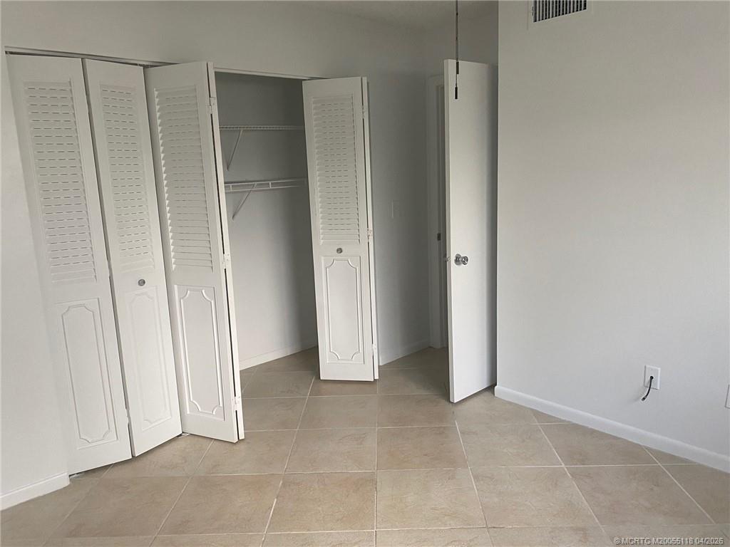 2118 Southeast Edler Drive, Unit B Stuart, FL 34994 - Photo 5 of 6 a view of an empty room