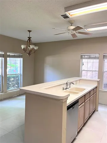 a bathroom with a sink a vanity and a mirror