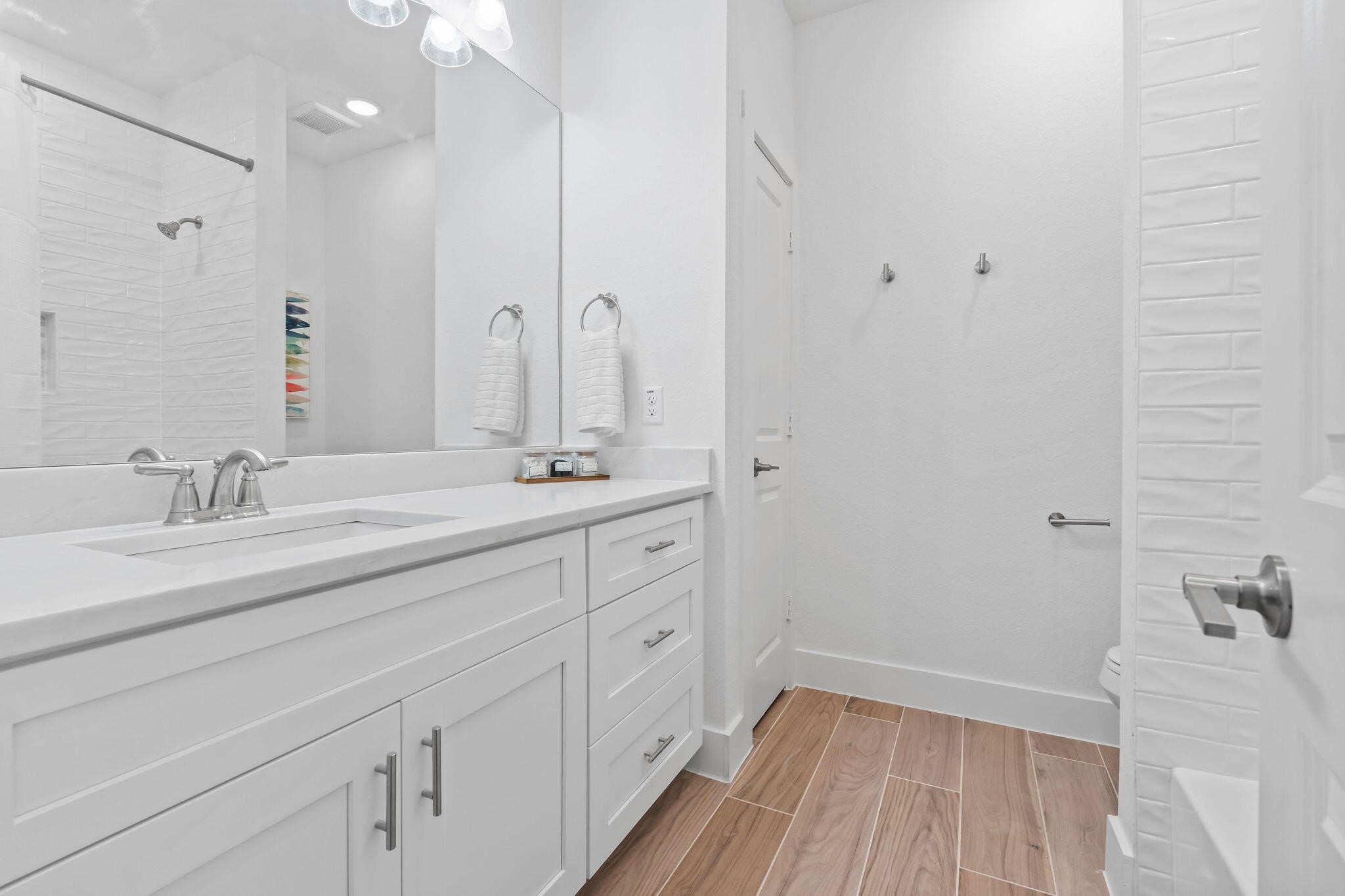 39645 Bosque Road Hempstead, TX 77445 - Photo 19 of 37 a bathroom with a sink a mirror and a shower
