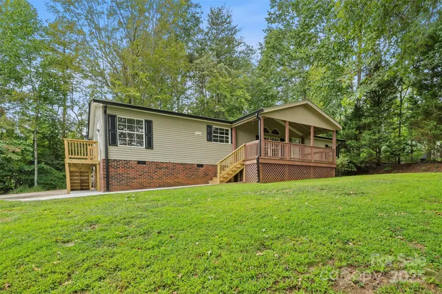 a house with a tree in front of it