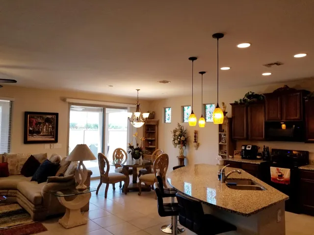 a living room with lots of furniture and appliances
