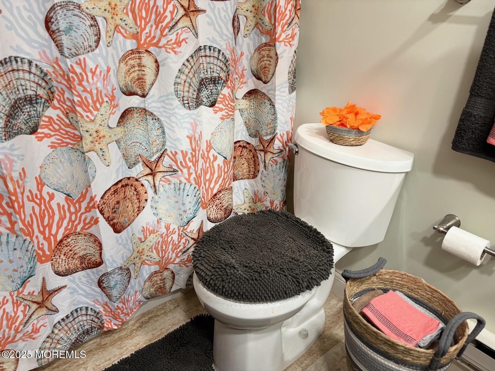 10 Constitution Boulevard, Unit B Whiting, NJ 08759 - Photo 48 of 57 a bathroom with a toilet and a sink