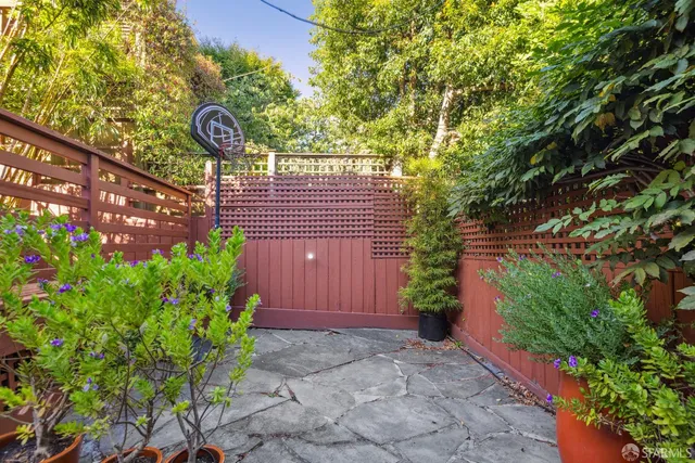 a sign that is sitting in the garden