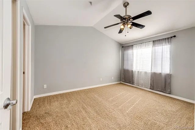 a view of room with ceiling fan