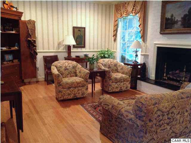 6 Canterbury Road Charlottesville, VA 22903 - Photo 3 of 8 a living room with furniture and a fireplace