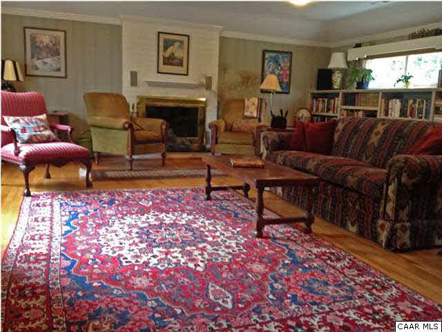 6 Canterbury Road Charlottesville, VA 22903 - Photo 4 of 8 a living room with furniture and a fireplace