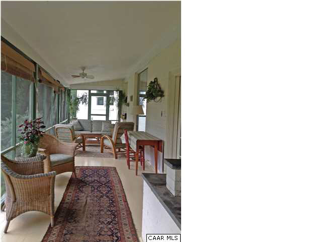 6 Canterbury Road Charlottesville, VA 22903 - Photo 7 of 8 a living room with furniture and a potted plant