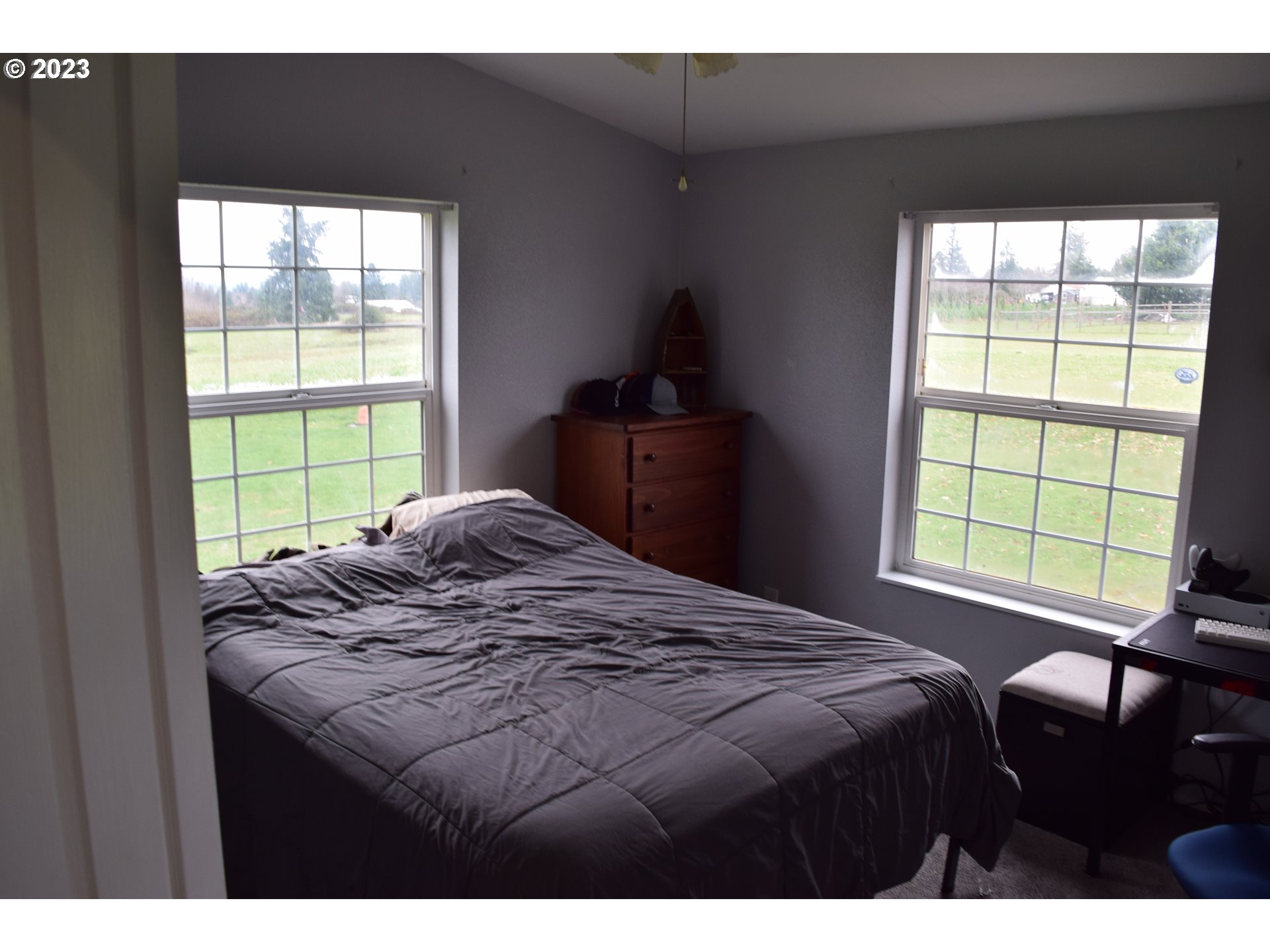 37075 Southeast Trubel Road Sandy, OR 97055 - Photo 12 of 15 a bedroom with a bed and a window