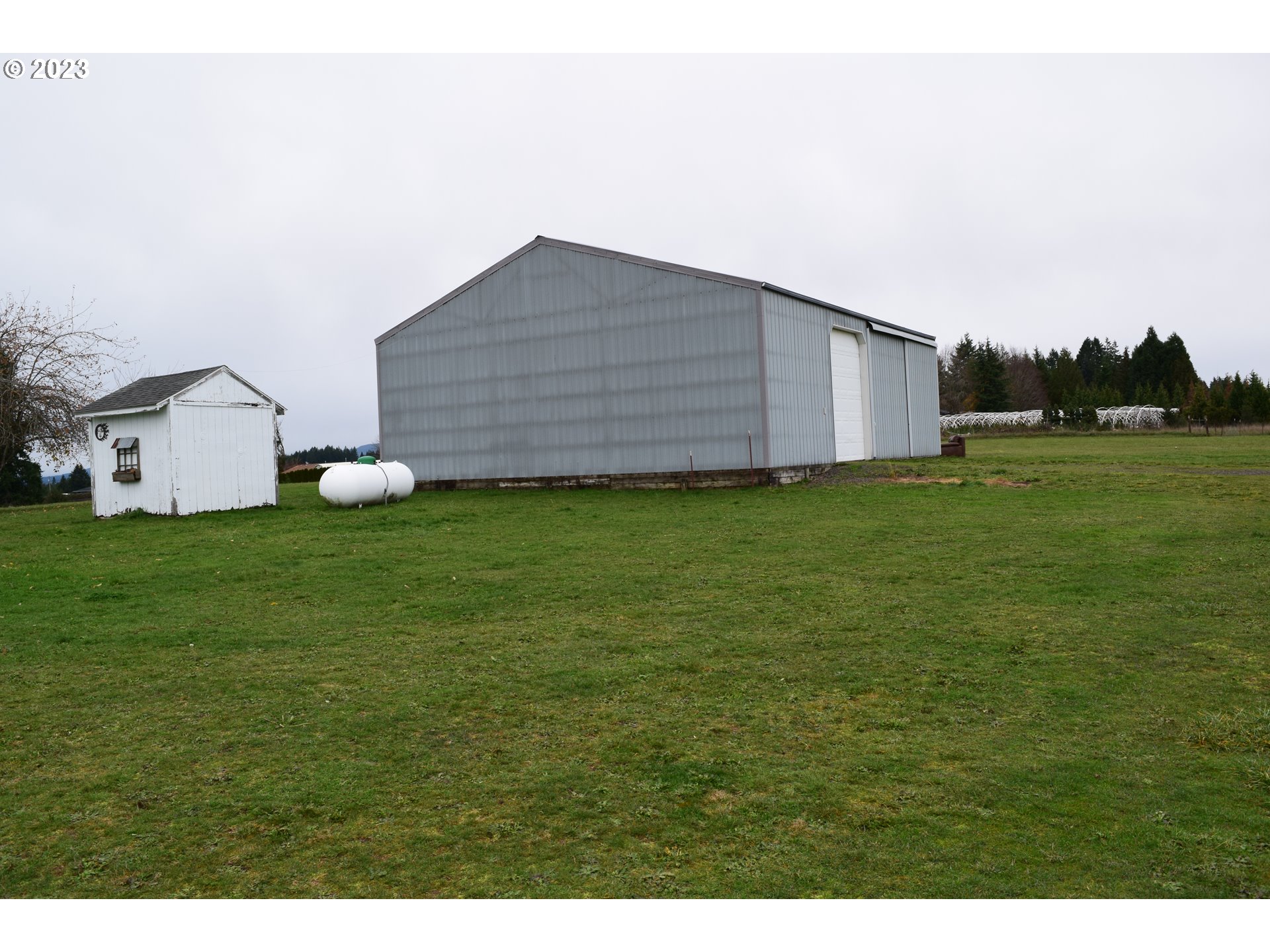 37075 Southeast Trubel Road Sandy, OR 97055 - Photo 15 of 15 a backyard of a house with lots of green space