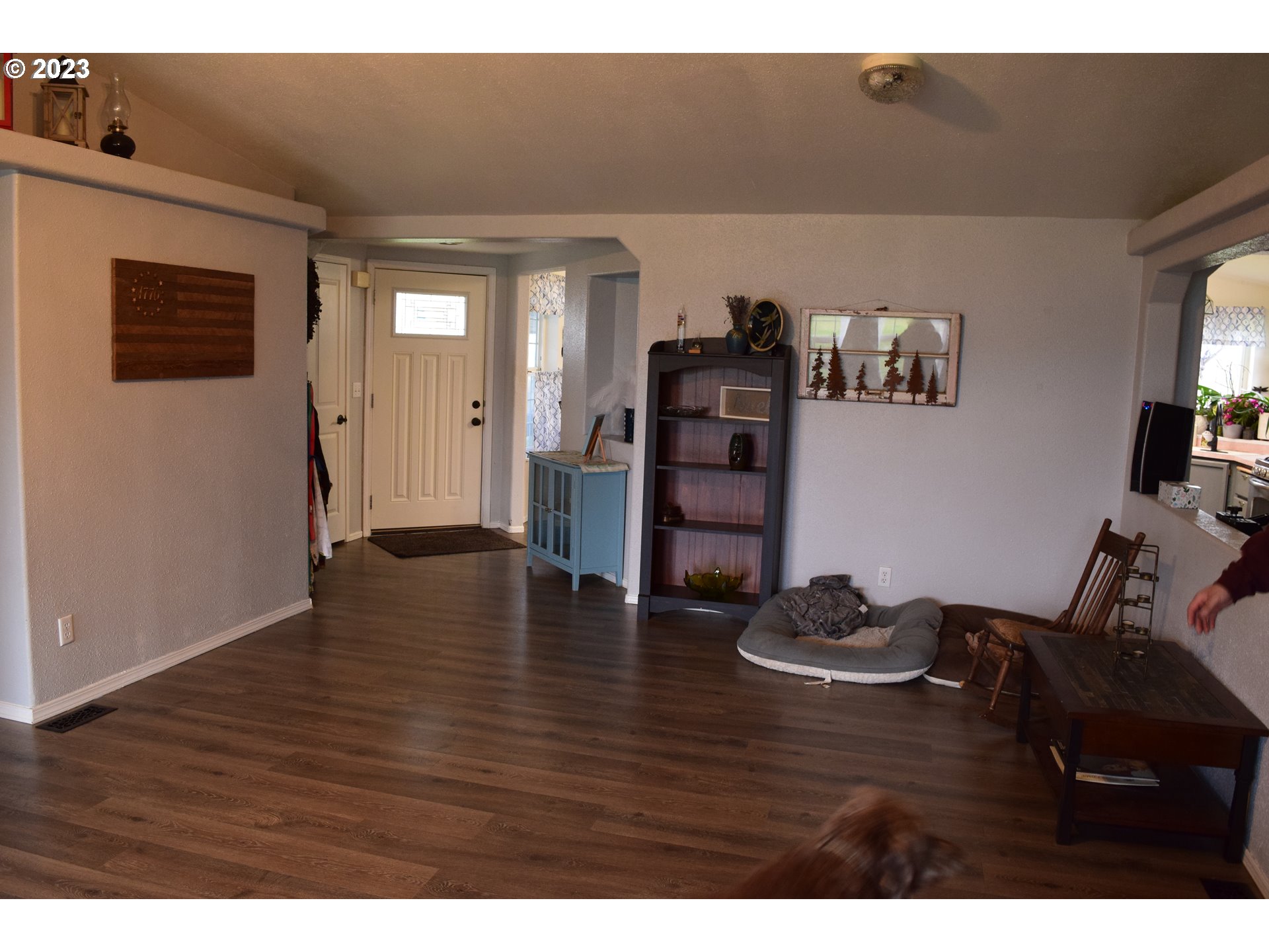 37075 Southeast Trubel Road Sandy, OR 97055 - Photo 3 of 15 a view of a livingroom with furniture hardwood floor and a ceiling fan