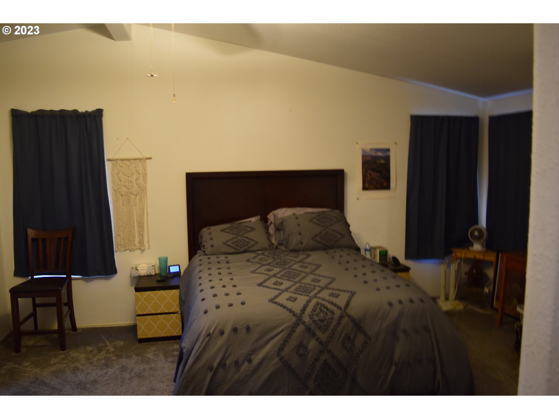 37075 Southeast Trubel Road Sandy, OR 97055 - Photo 8 of 15 a bedroom with a bed and a chair