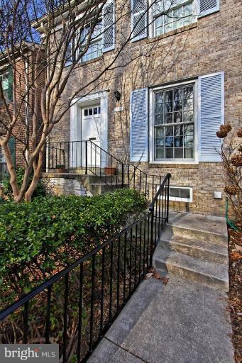 1552 Chatham Colony Court Reston, VA 20190 - Photo 1 of 1 a front view of a house with a garden