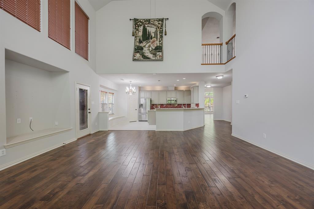 362 Spring Meadow Drive Fairview, TX 75069 - Photo 17 of 38 a view of cabinets and wooden floor