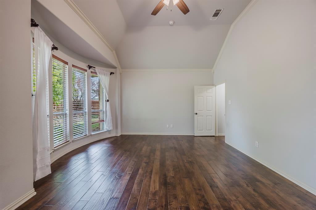 362 Spring Meadow Drive Fairview, TX 75069 - Photo 20 of 38 wooden floor in an empty room with a window
