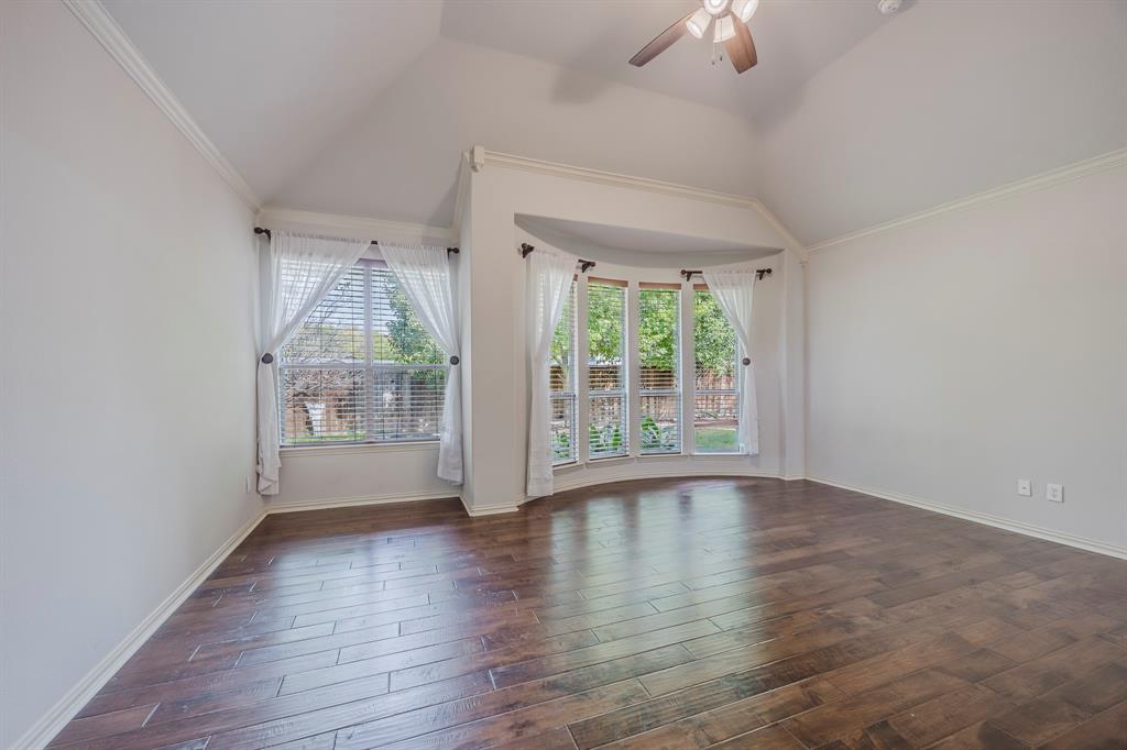 362 Spring Meadow Drive Fairview, TX 75069 - Photo 21 of 38 wooden floor in an empty room with a window