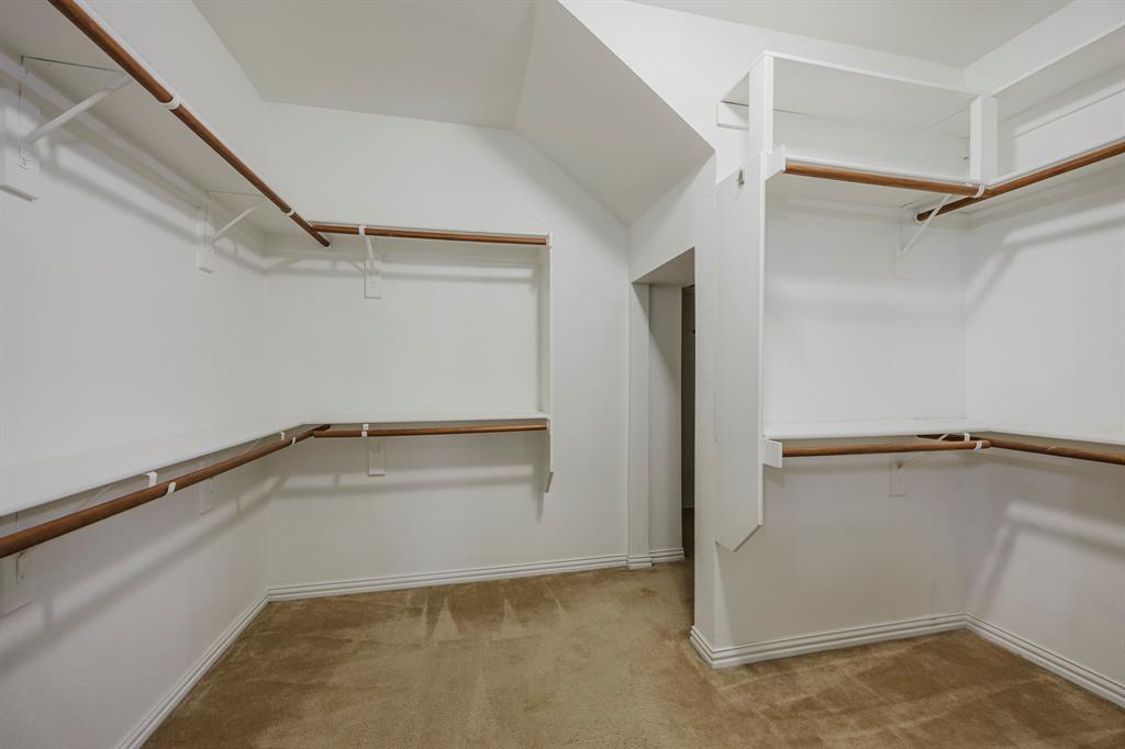 362 Spring Meadow Drive Fairview, TX 75069 - Photo 24 of 38 a view of an empty walk in closet