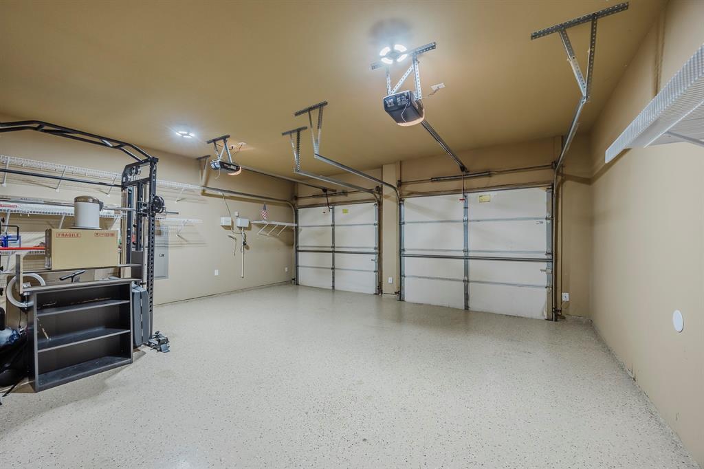 362 Spring Meadow Drive Fairview, TX 75069 - Photo 34 of 38 a view of a garage room
