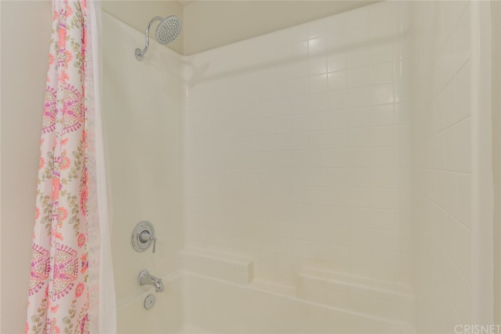 713 South Azusa Avenue, Unit D Azusa, CA 91702 - Photo 11 of 44 a bathroom with a shower curtain