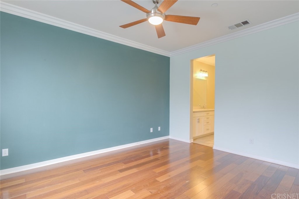 713 South Azusa Avenue, Unit D Azusa, CA 91702 - Photo 28 of 44 wooden floor in an empty room with a window