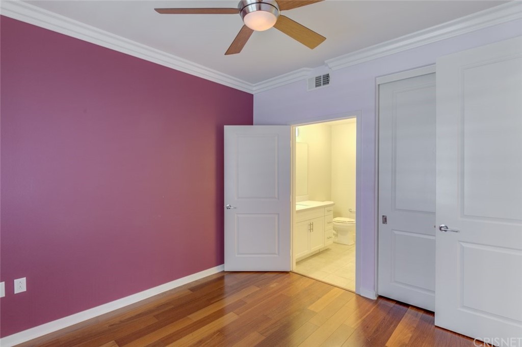 713 South Azusa Avenue, Unit D Azusa, CA 91702 - Photo 7 of 44 wooden floor in an empty room with a window