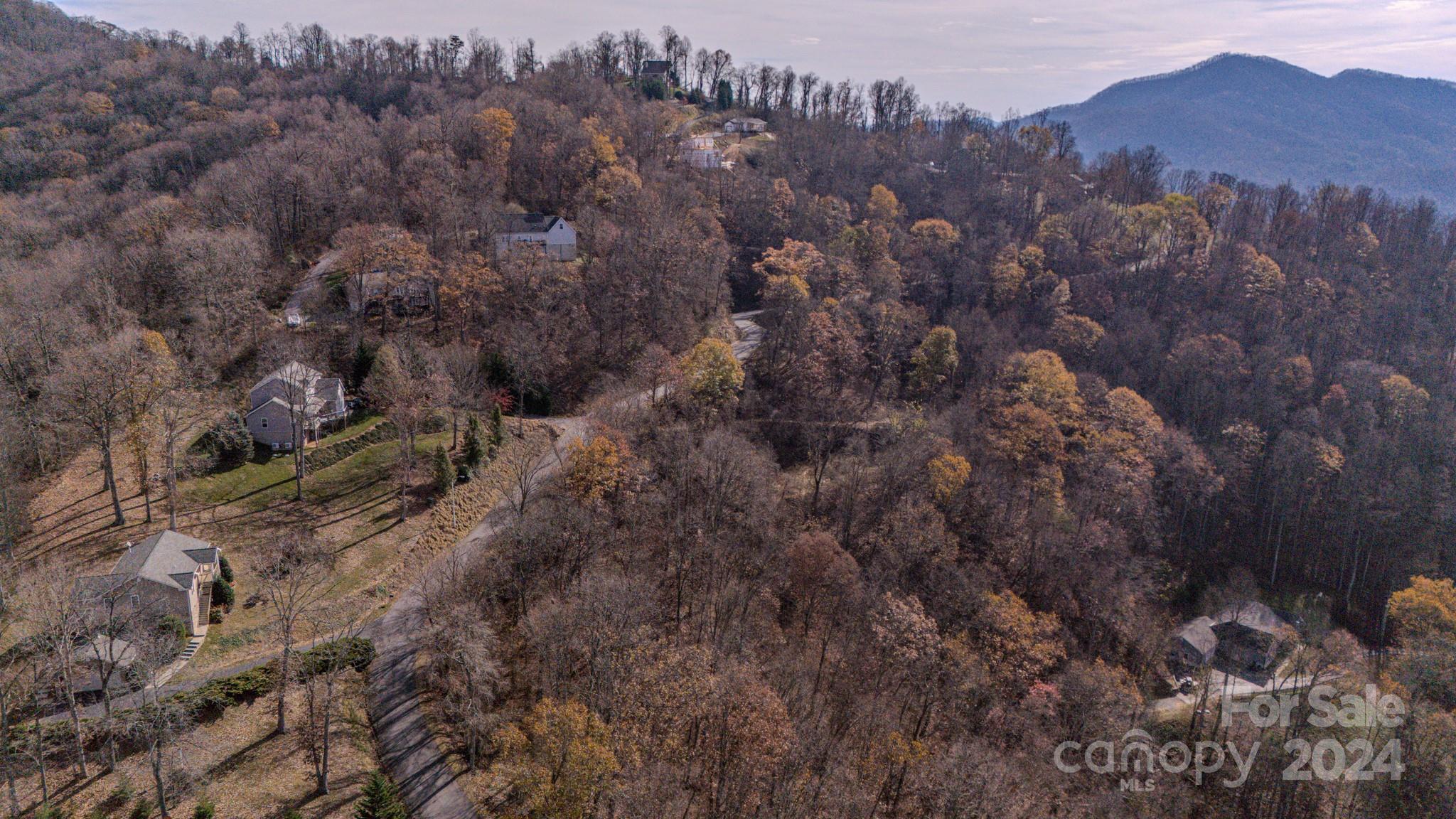 17 Broken Arrow Trail, Unit 17 Canton, NC 28716 - Photo 9 of 10 an aerial view of house with yard and mountain view in back