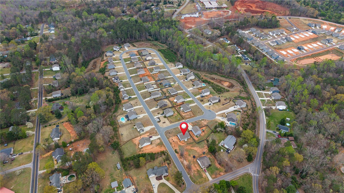114 Sunny Pt Loop Central, SC 29630 - Photo 22 of 25 This elevated view captures a serene residential development nestled amidst verdant landscapes.