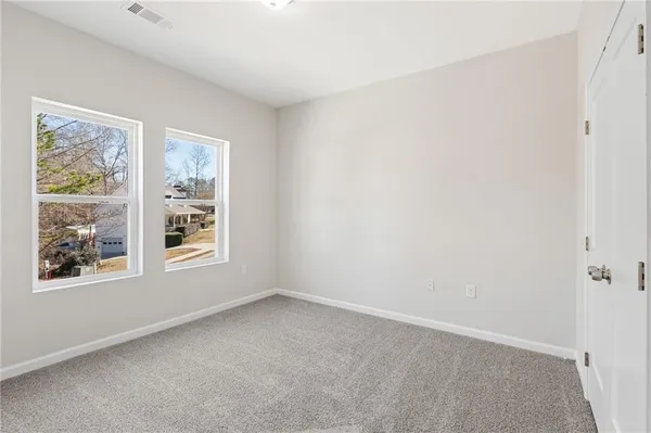 an empty room with windows