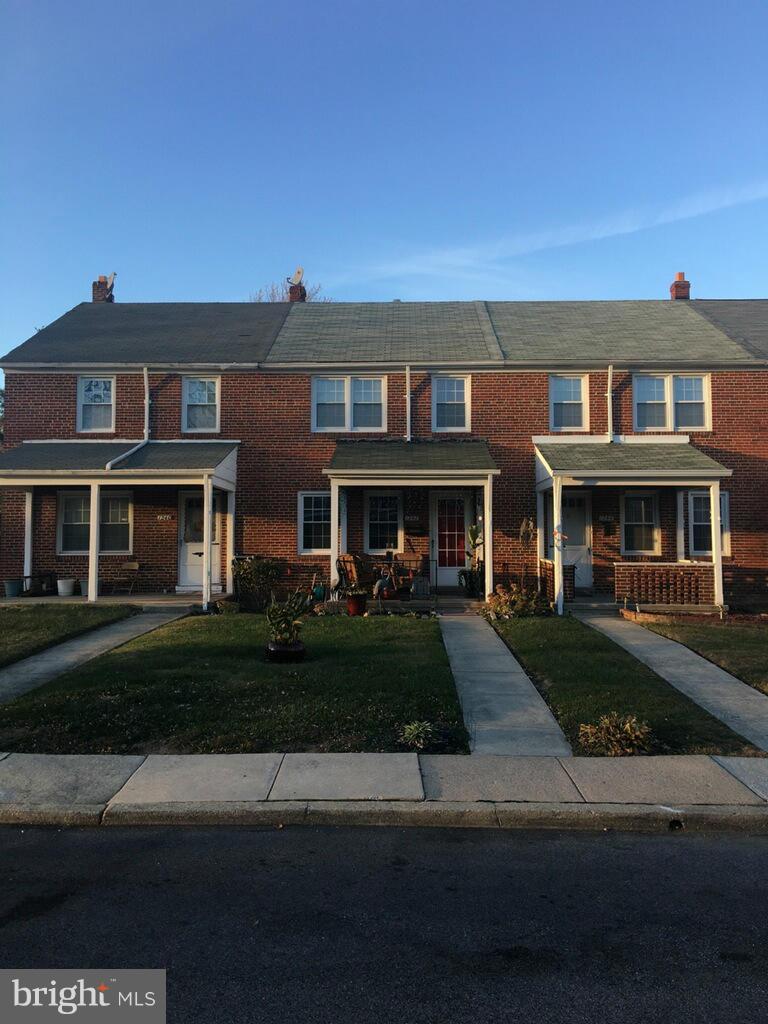 1242 Cedarcroft Road Baltimore, MD 21239 - Photo 2 of 22 a front view of residential houses